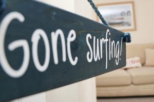 Sandpiper holiday home surfing sign